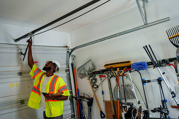 Professional Garage Door Panel Replacement technician working in Warren Park, IN